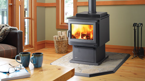Regency F3500 free standing wood stove fireplace on stone platform