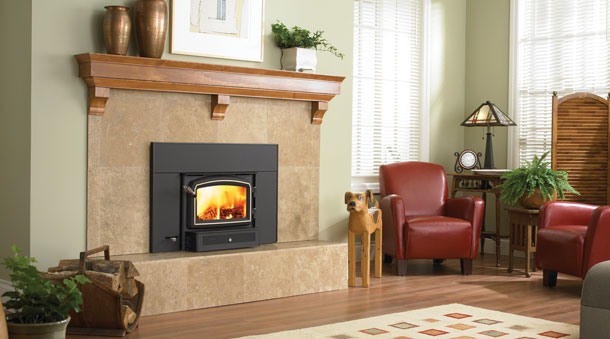 regency i1200 Wood Fireplace Insert in beige stone surround